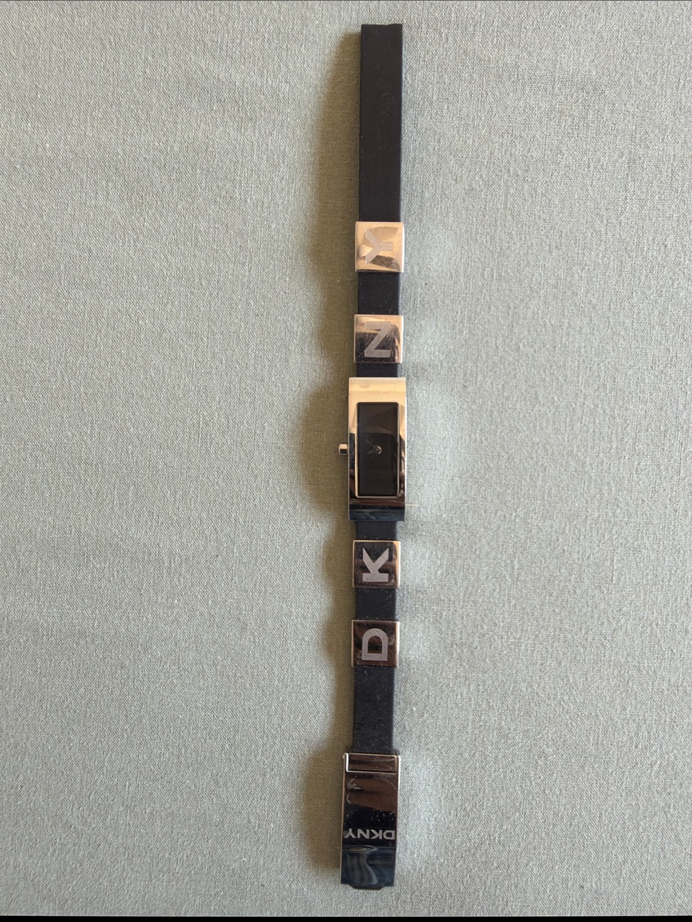 DKNY Black Leather Strap Watch with Silver Logo Accents